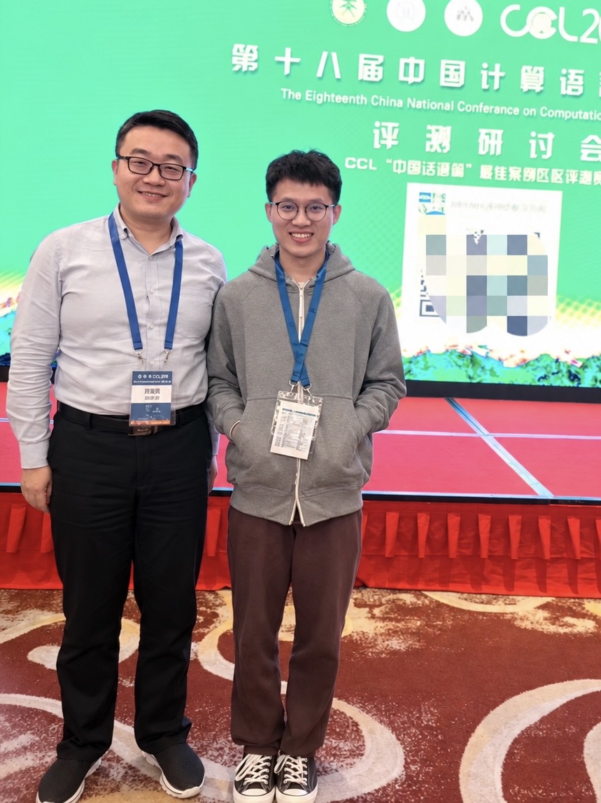 Two-person photograph at a CCL conference